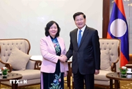 Front leader meets Lao Party General Secretary, President