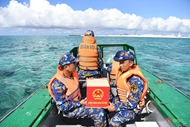 Ballots amidst open sea: Faith sent to motherland
