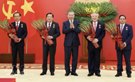 Party chief presents elite honors to incumbent, former leaders