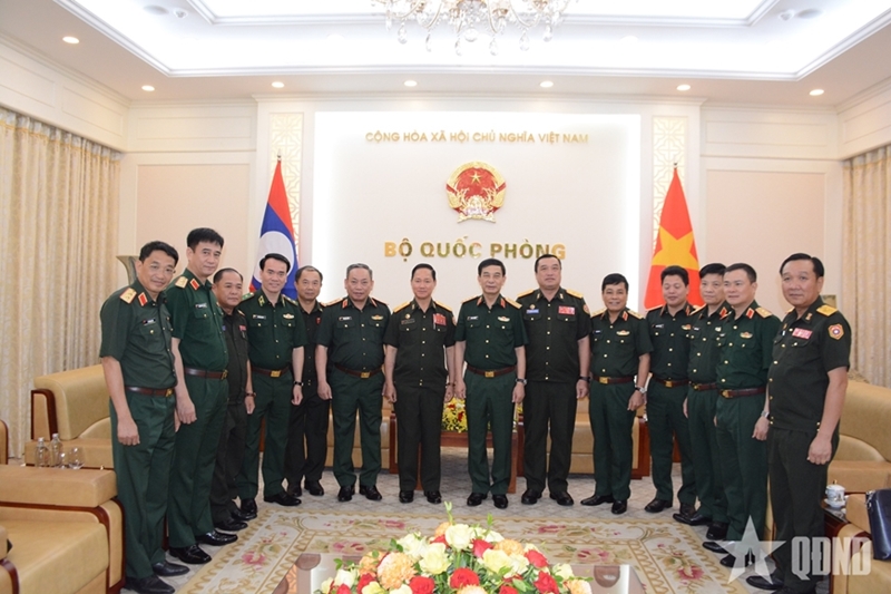 Defense minister hosts Lao counterpart