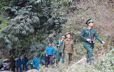 Bộ đội Biên phòng đồn Pù Nhi(Bộ chỉ huy Bộ đội Biên phòng tỉnh Thanh Hóa phối hợp với lực dân quân và công an xã Pù Nhi tuần tra bảo vệ biên giới.