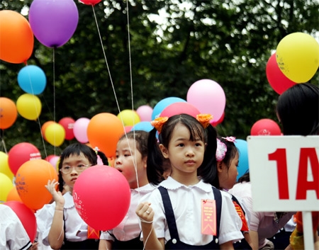 Gương mặt trong sáng, đầy niềm vui của em bé Hà Nội