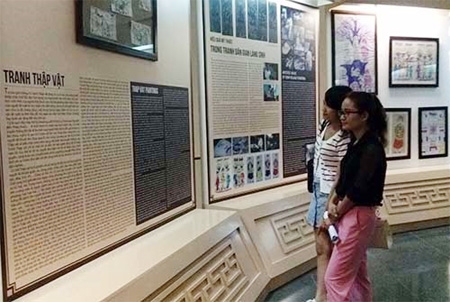 Vietnamese folk paintings on display in Hanoi